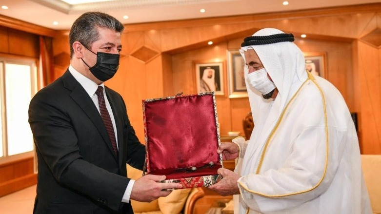 Kurdistan Region Prime Minister Masrour Barzani (left) receiving a present from Sultan bin Muhammad Al-Qasimi, the ruler of the Emirate of Sharjah in the United Arab Emirates, Mar. 26, 2022. (Photo: KRG)